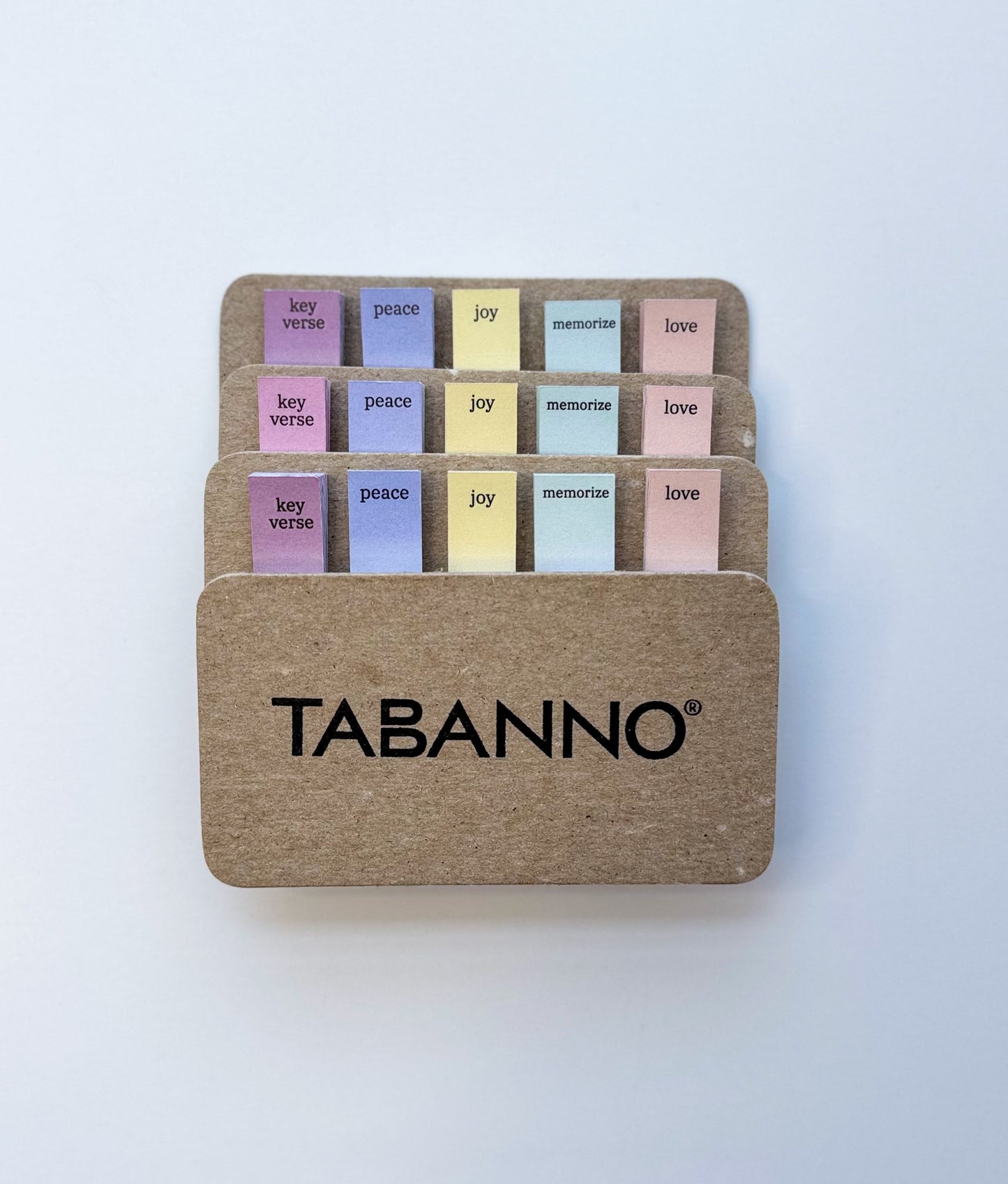 Colorful tabs for the Bible on a white background