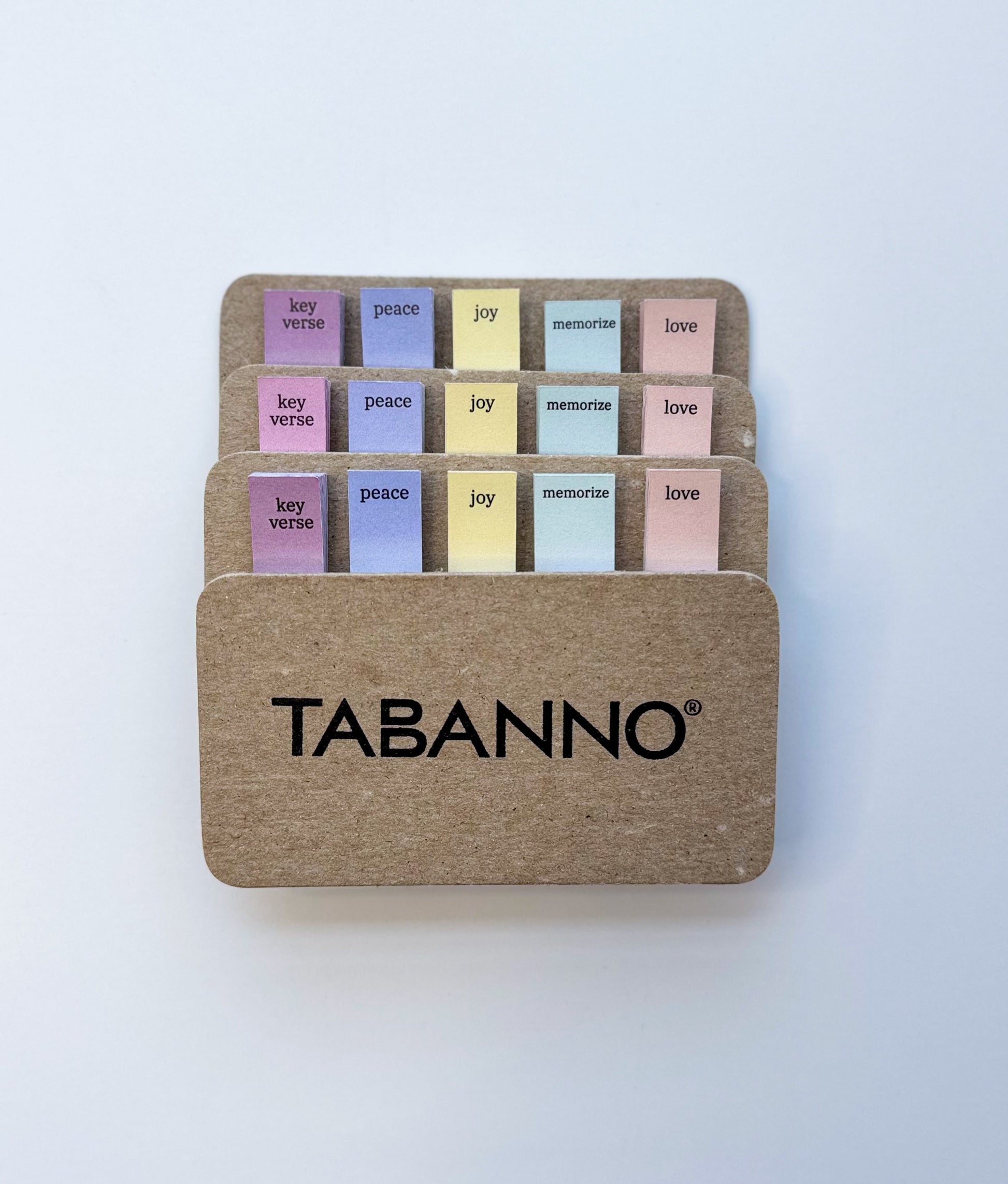 Colorful tabs for the Bible on a white background