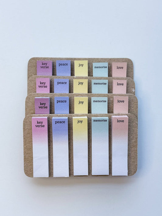 Set of colorful sticky notes made for the bible on a white background