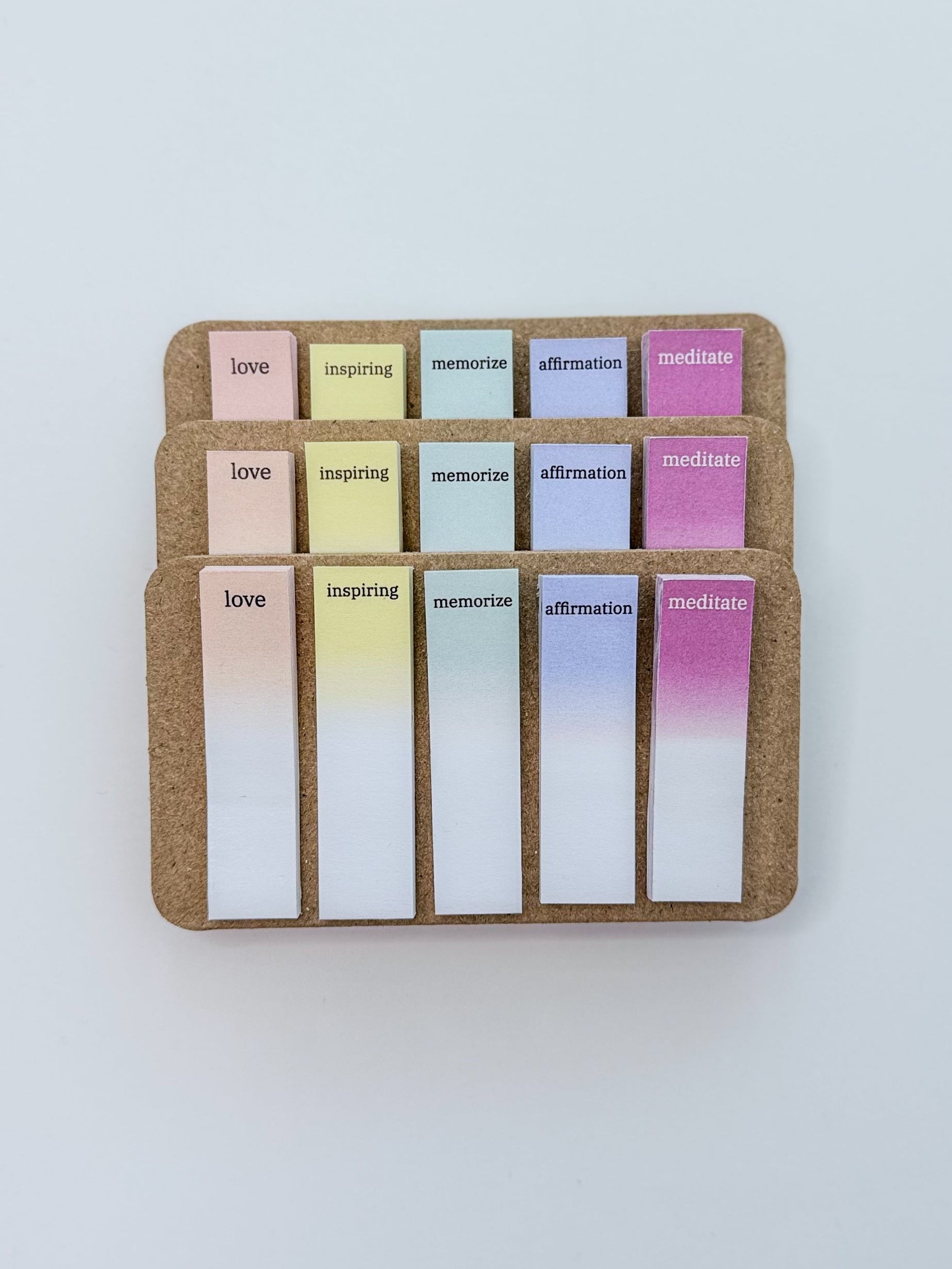 Set of color swatch annotating tabs on a cardboard holder on a white background